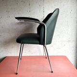 Vintage green faux leather and chrome armchair