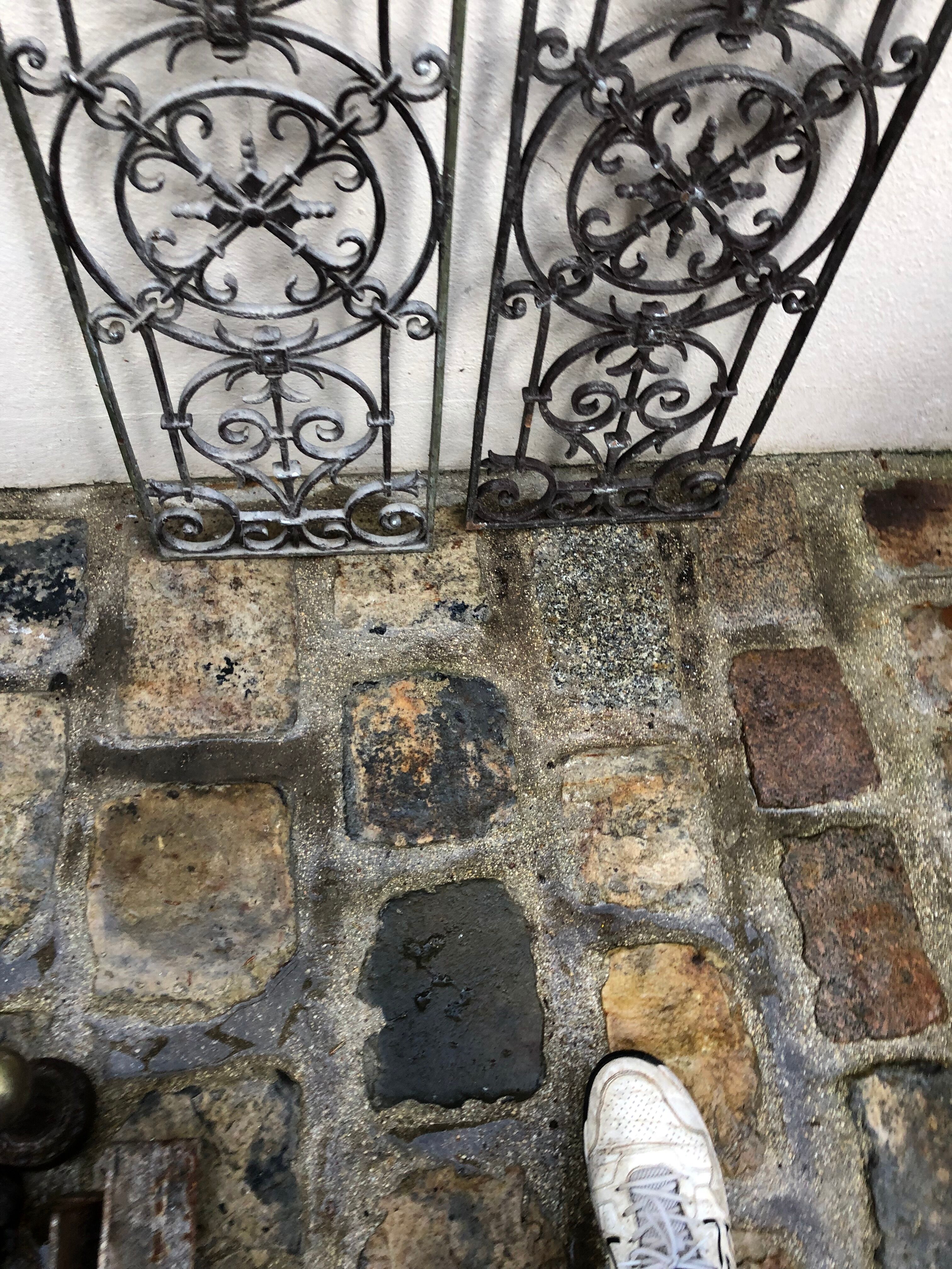 Pair of old cast iron door grilles