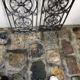 Pair of old cast iron door grilles