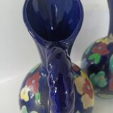 Pair of hand-painted earthenware cruet jug vases. Numbered