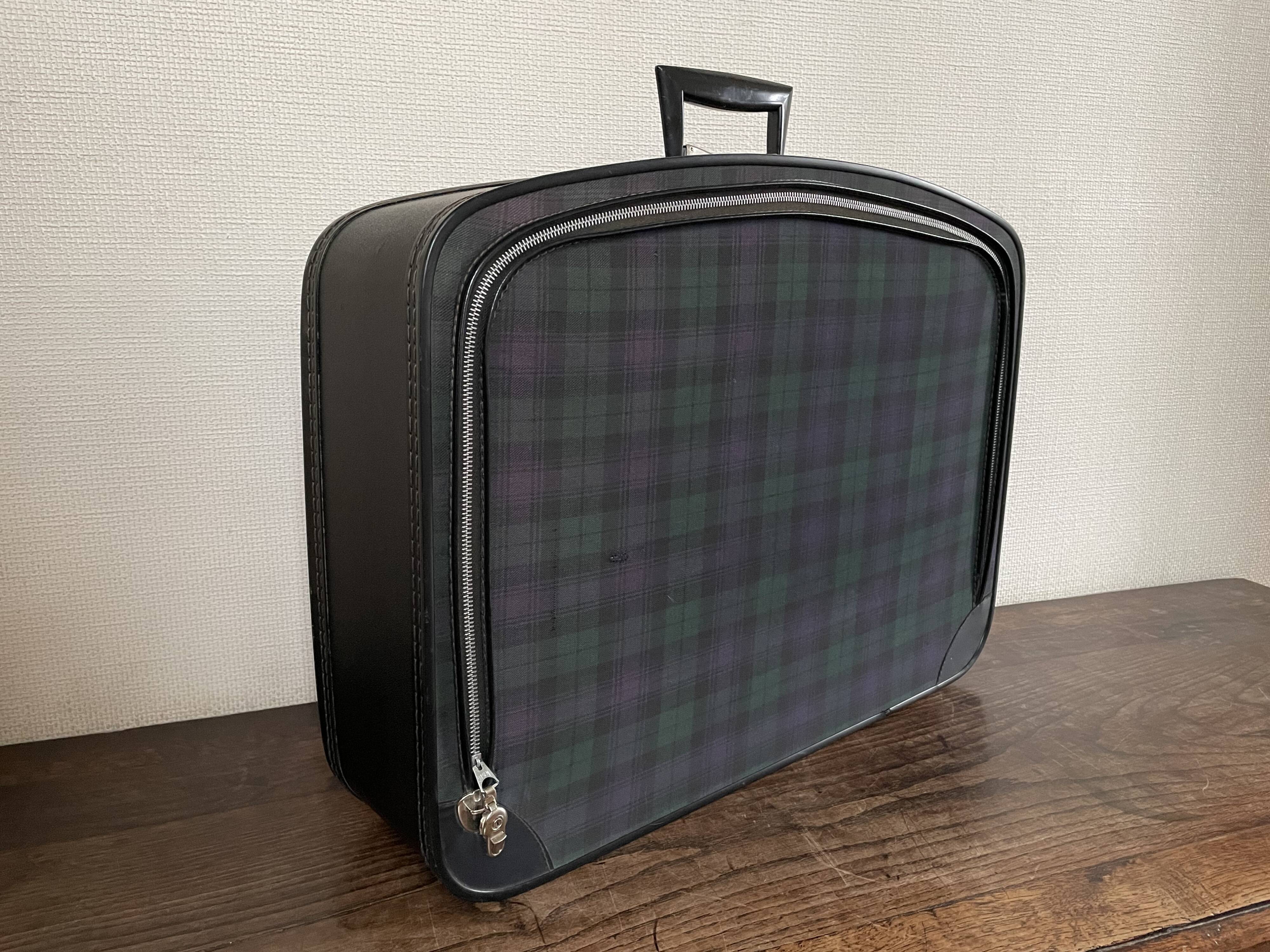 Tartan check suitcase