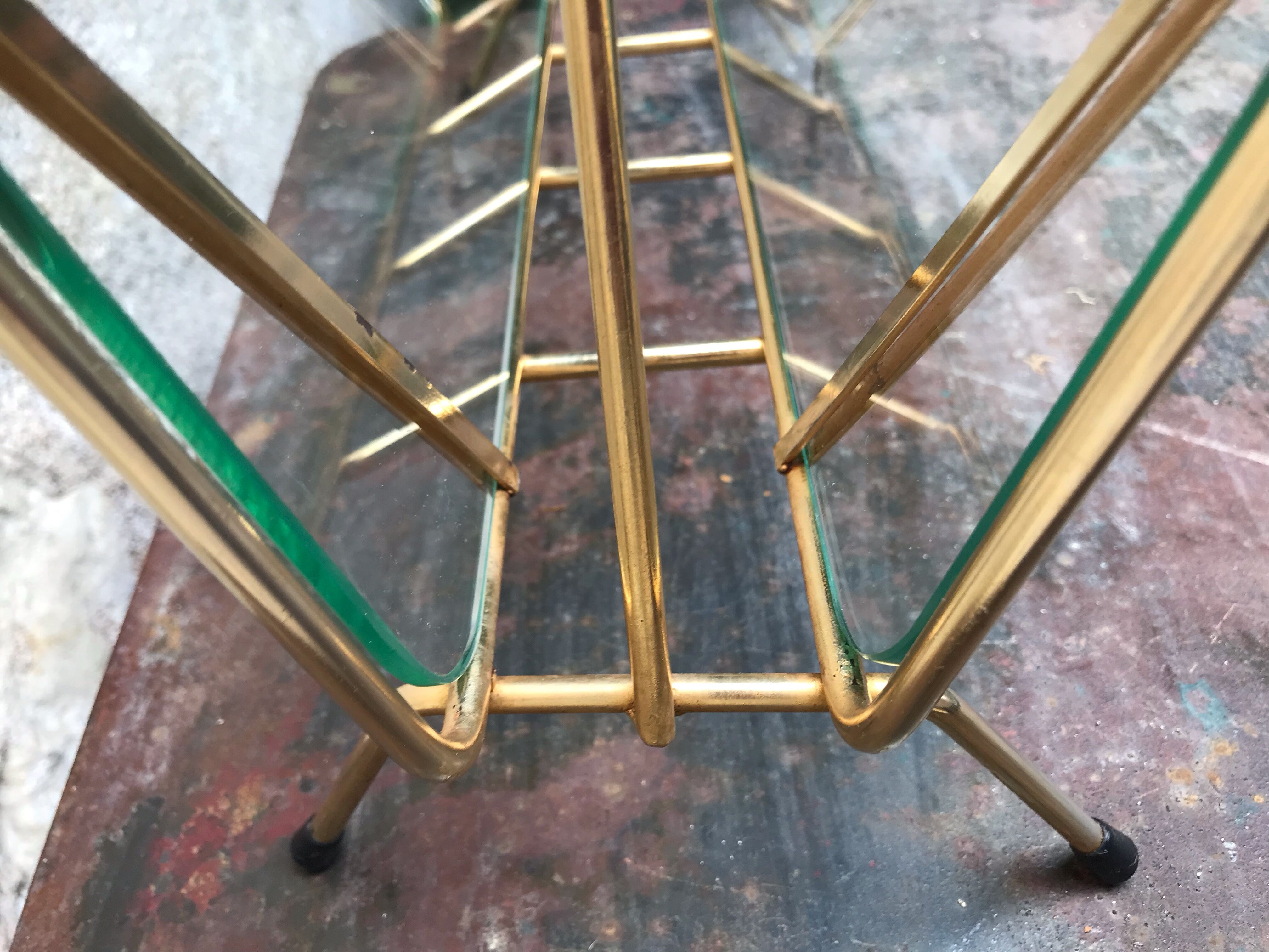 Glass and gold metal magazine door