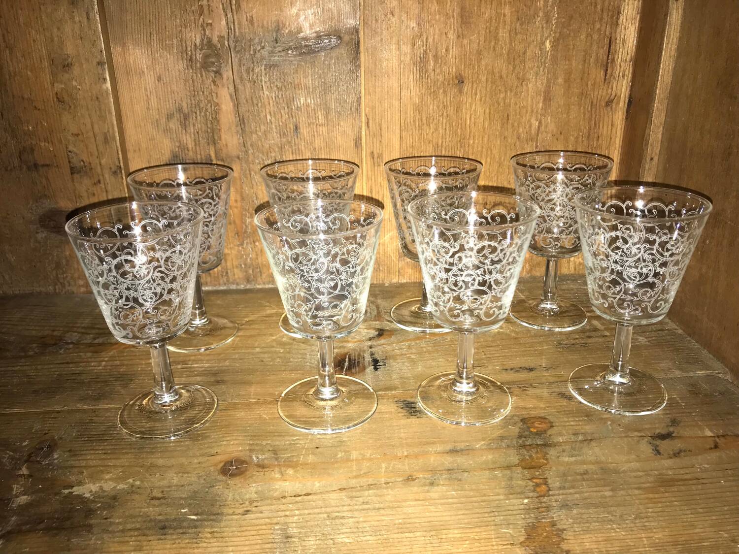 Set of old glasses with white arabesque pattern