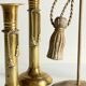 Trio of vintage knotted candlesticks brass