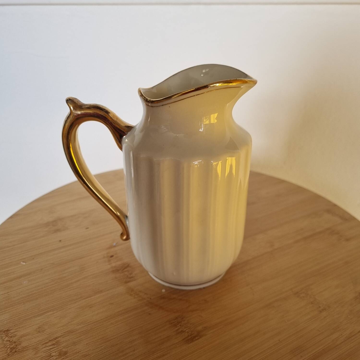 White and gold porcelain milk jug