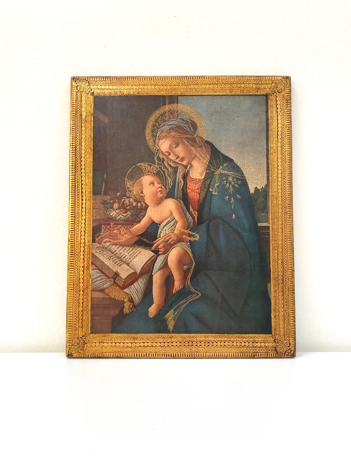 Religious icon on gilded wood: The Madonna of the Book