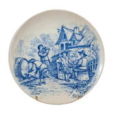 Old advertising plate with blue decoration after Teniers – 100,000 Shirts Paris