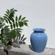 Minimalist plain blue ceramic baluster vase