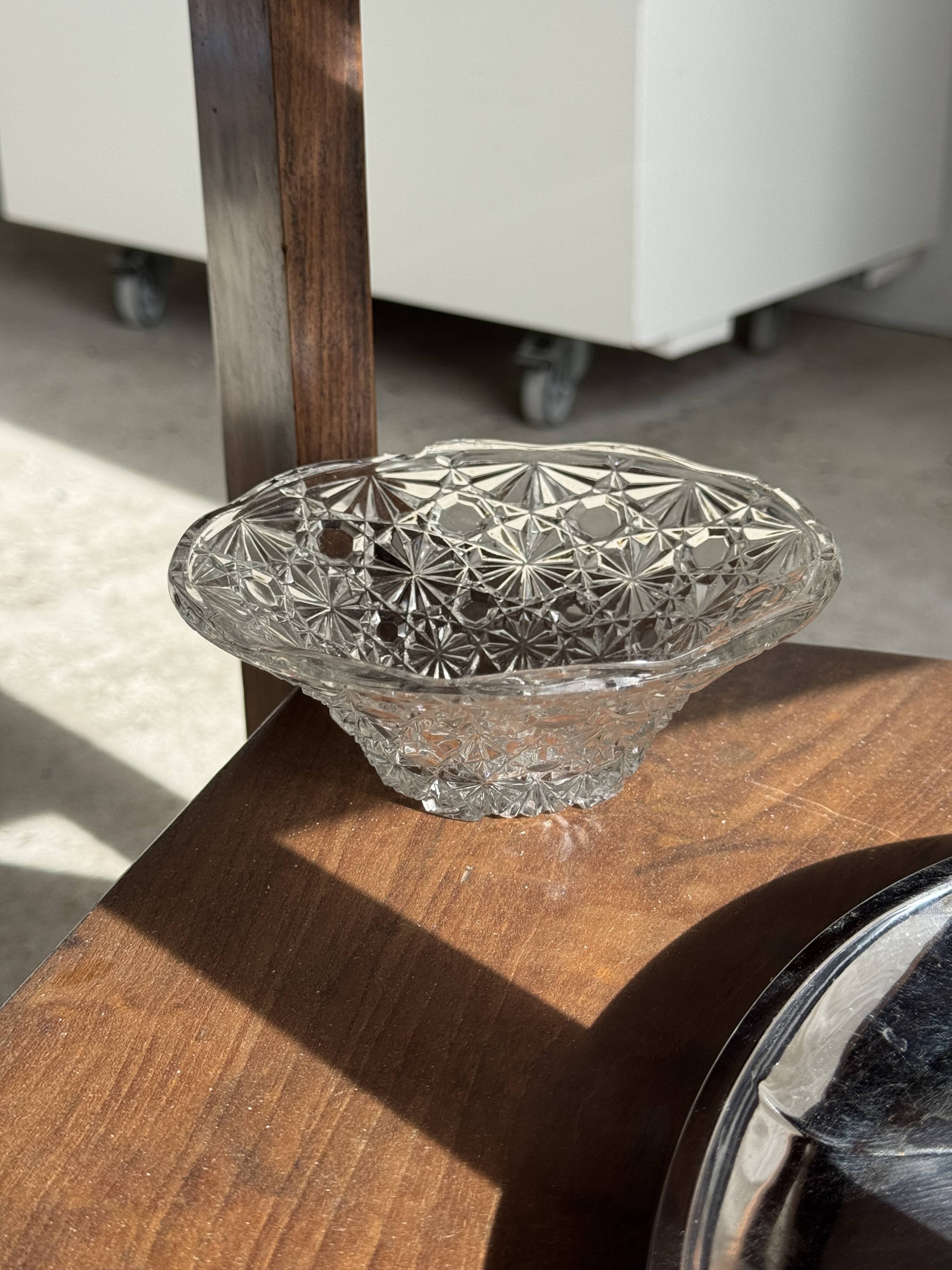 Small glass dish with vintage diamond points, a sparkle.