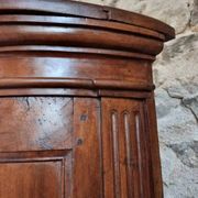 Antique demi-lune cabinet in walnut, late 18th century, French château.