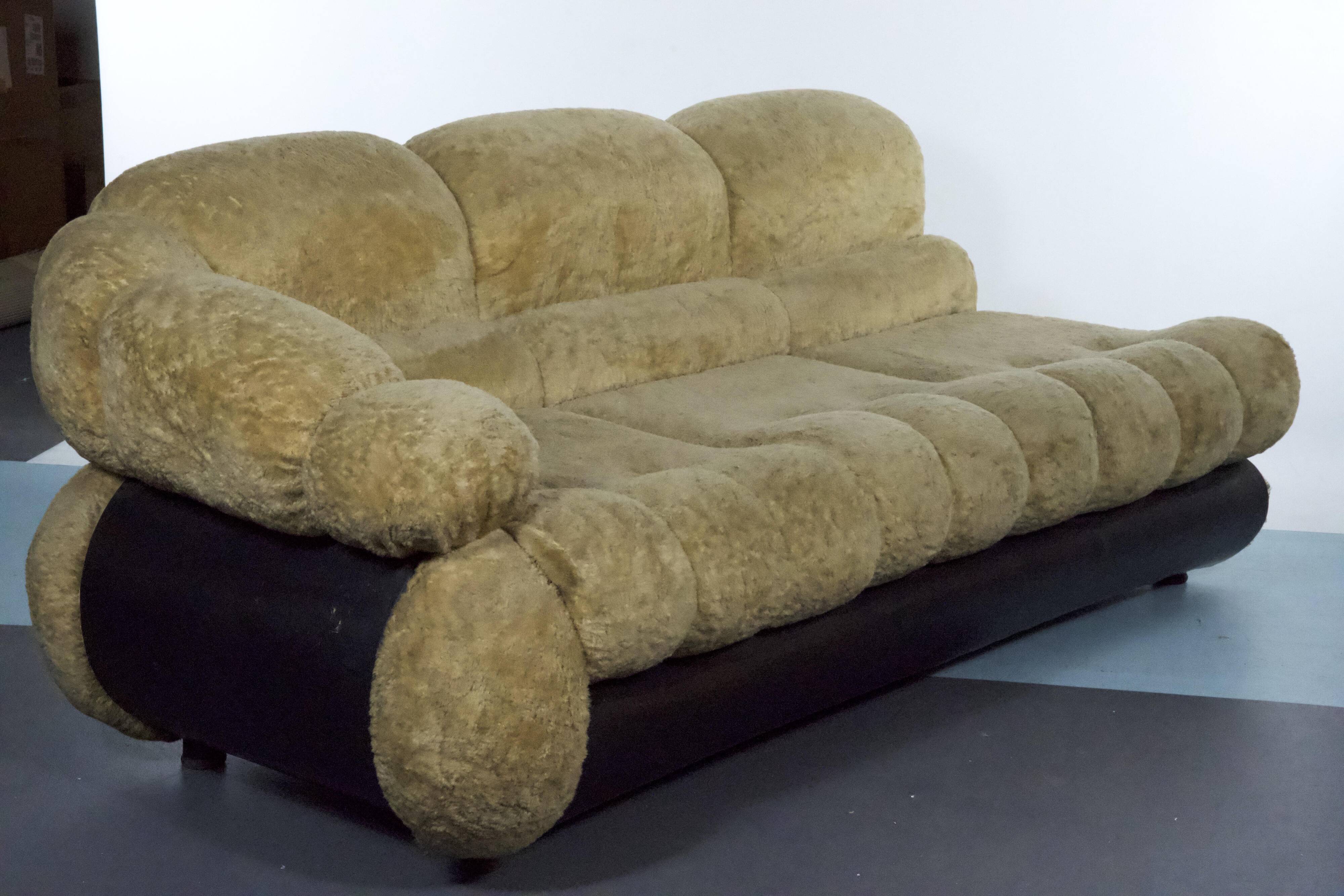 three-seater sofa designed by Adriano Piazzesi, produced in Italy during the 1970s. Upholster