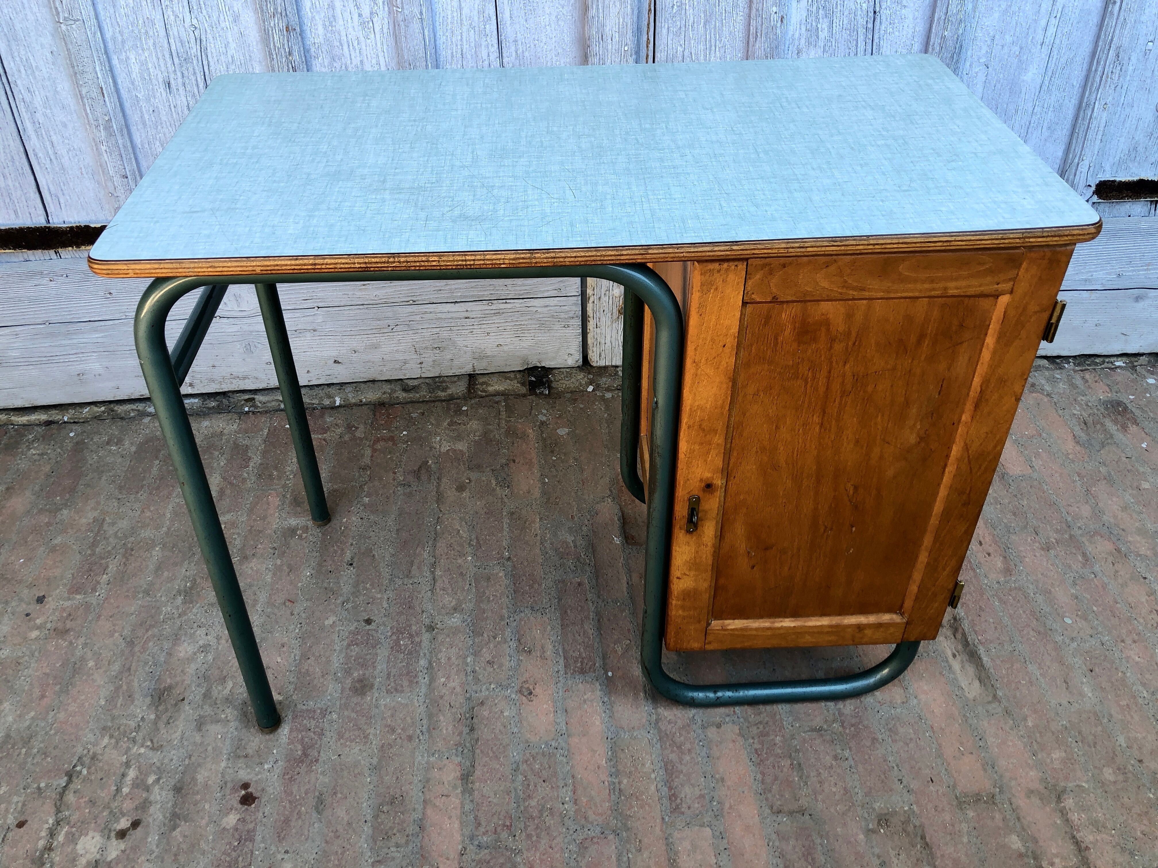 Office 1950 tubular metal and mint green formica