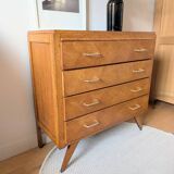Vintage chest of drawers with checkerboard and compass feet