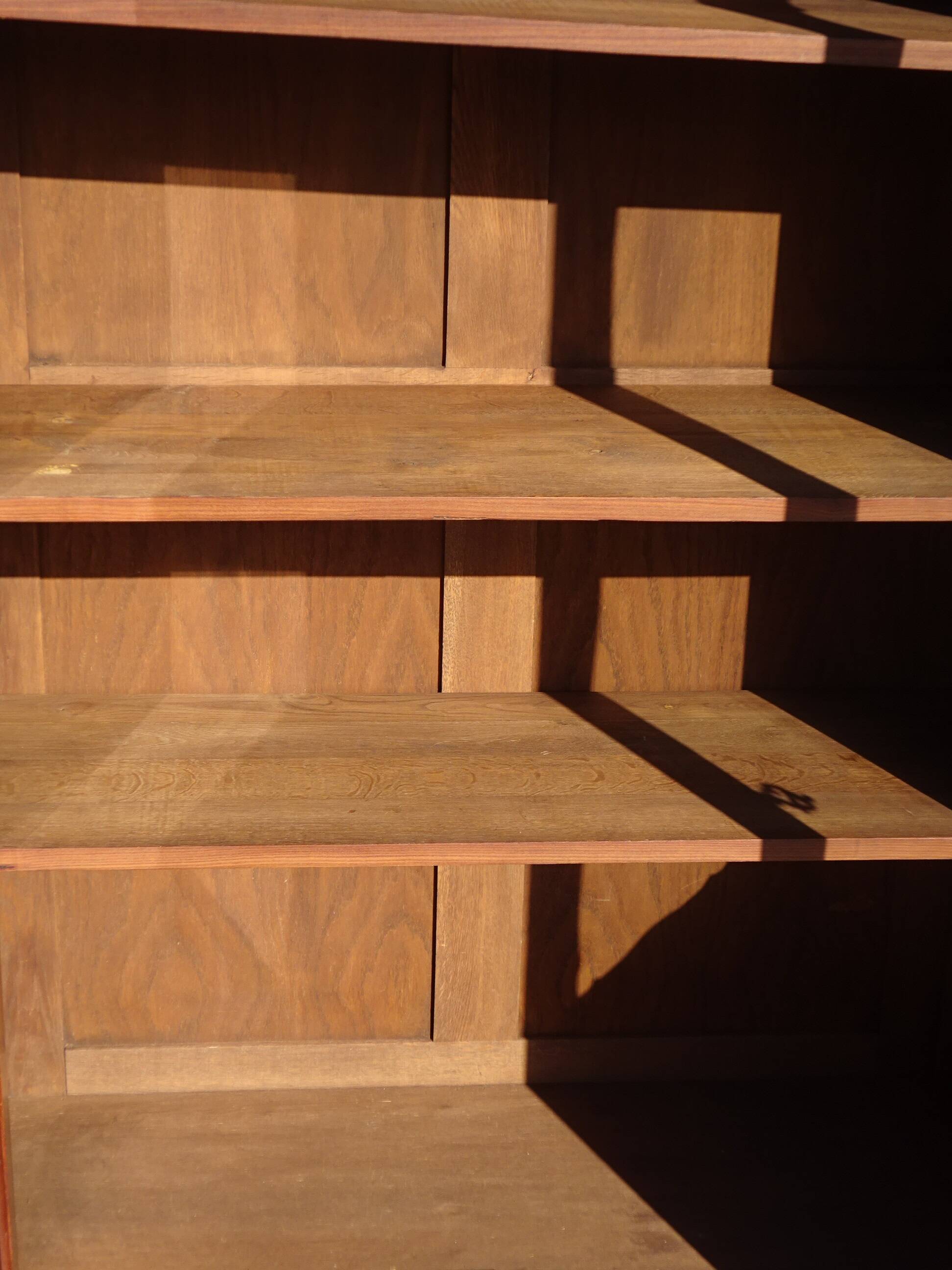 Glass library with rosewood marquetry in the Louis XV style.