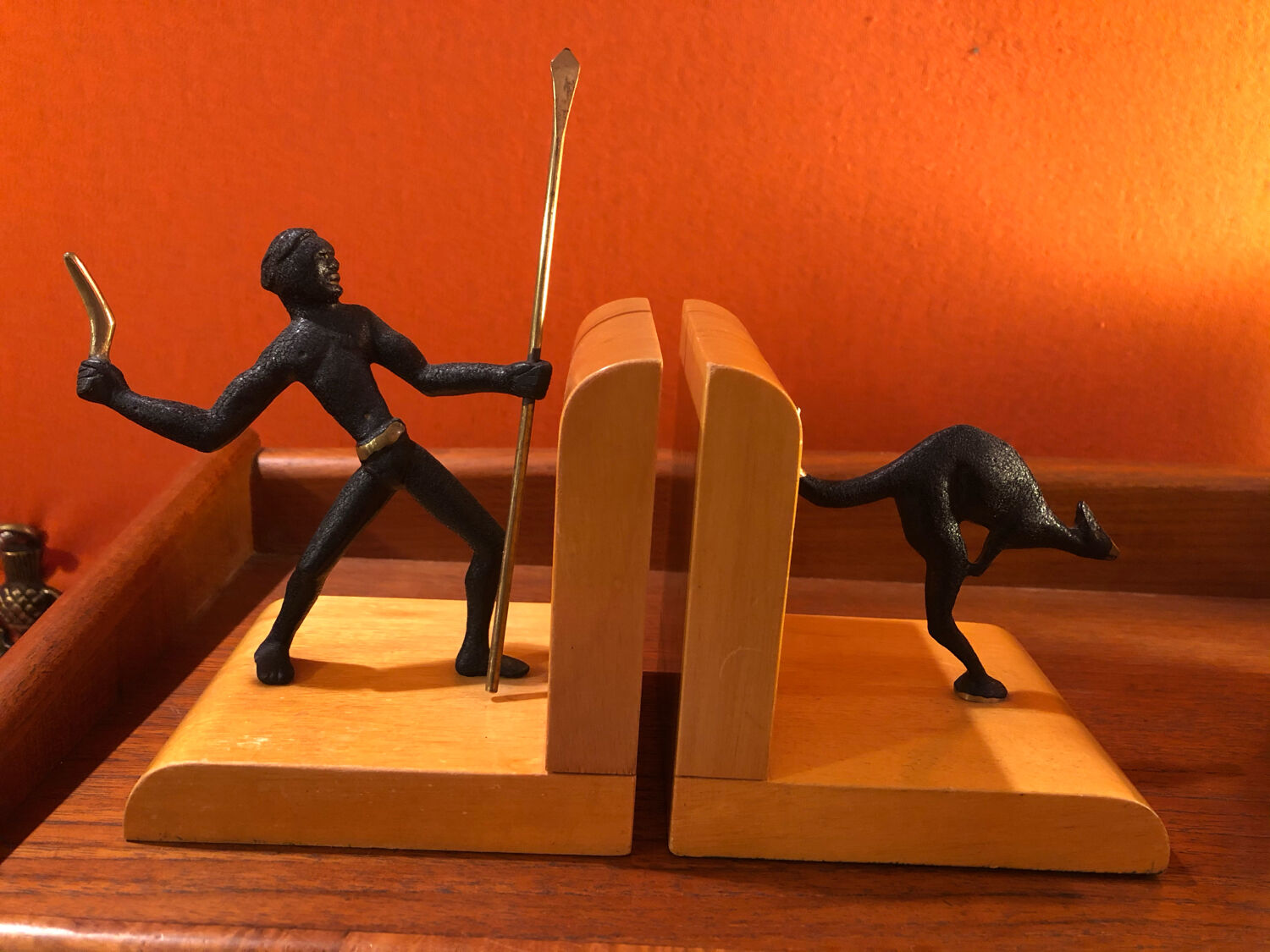 Art Deco bronze and sycamore bookends pair