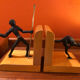 Art Deco bronze and sycamore bookends pair