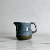 Blue and beige ceramic milk jug