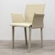Beige leather chair with armrests