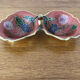 Empty pockets in brass and floral decoration