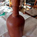 Leather covered bottle with stopper