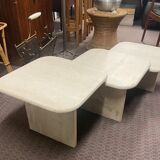 Modular pull-out coffee tables in travertine