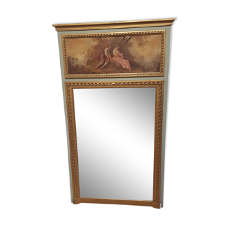 TRUMEAU wood gilded stucco beveled glass in the style of the 18th century