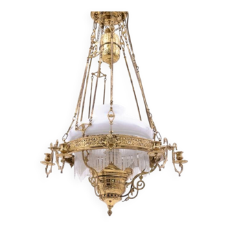 Brass chandelier from the first half of the 20th century.