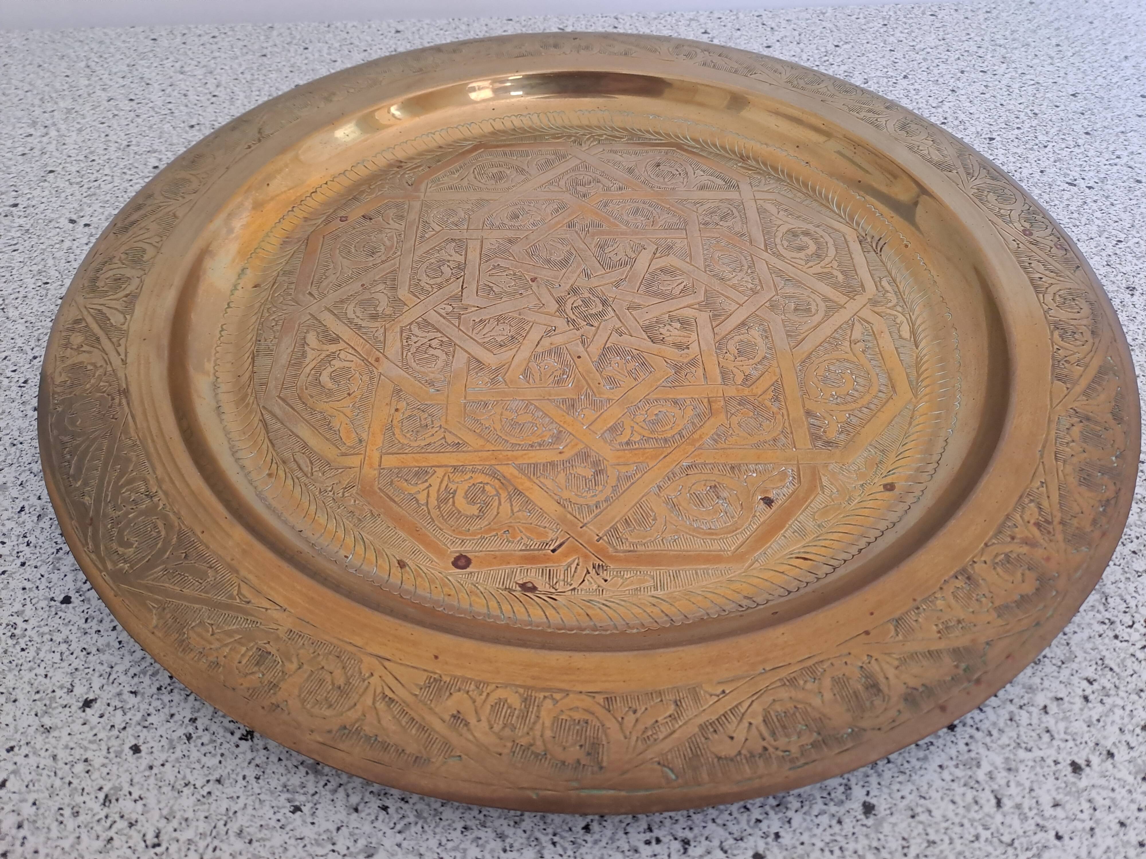 Large chiseled metal plate