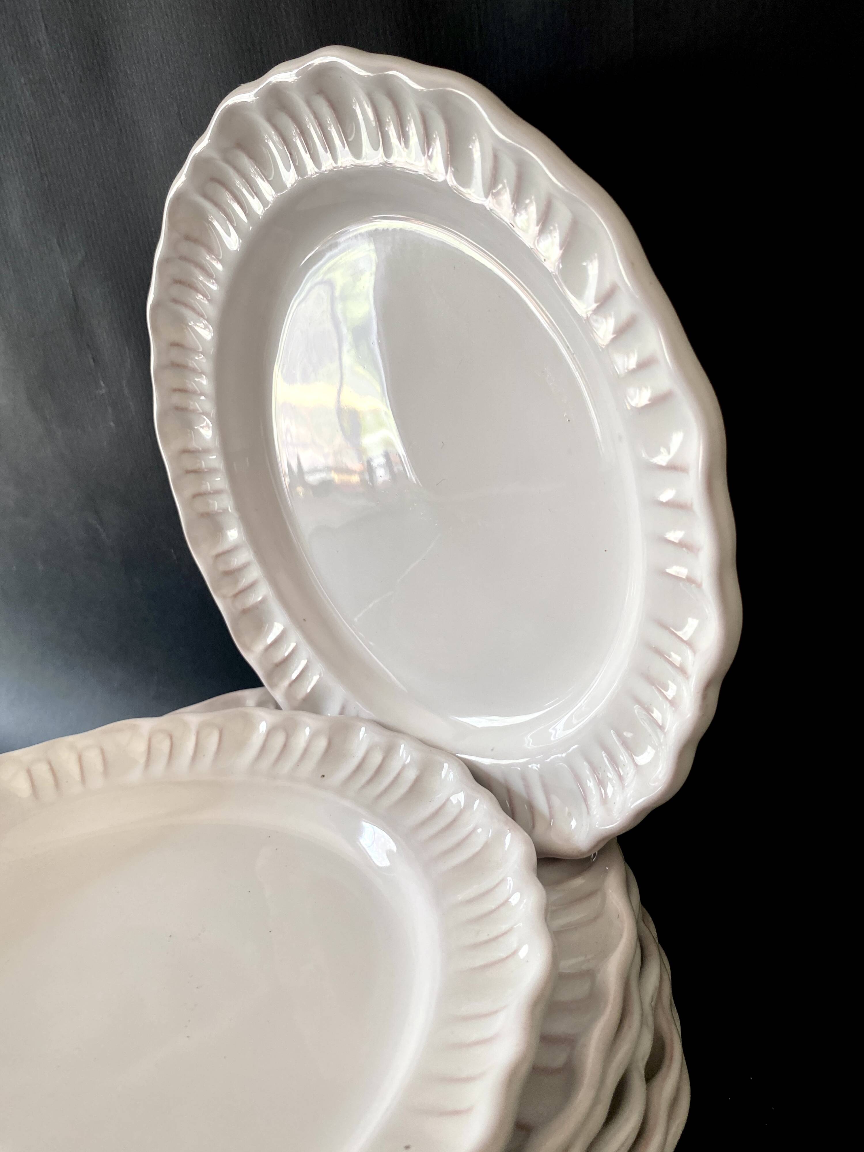 8 Provençal enamelled earthenware plates