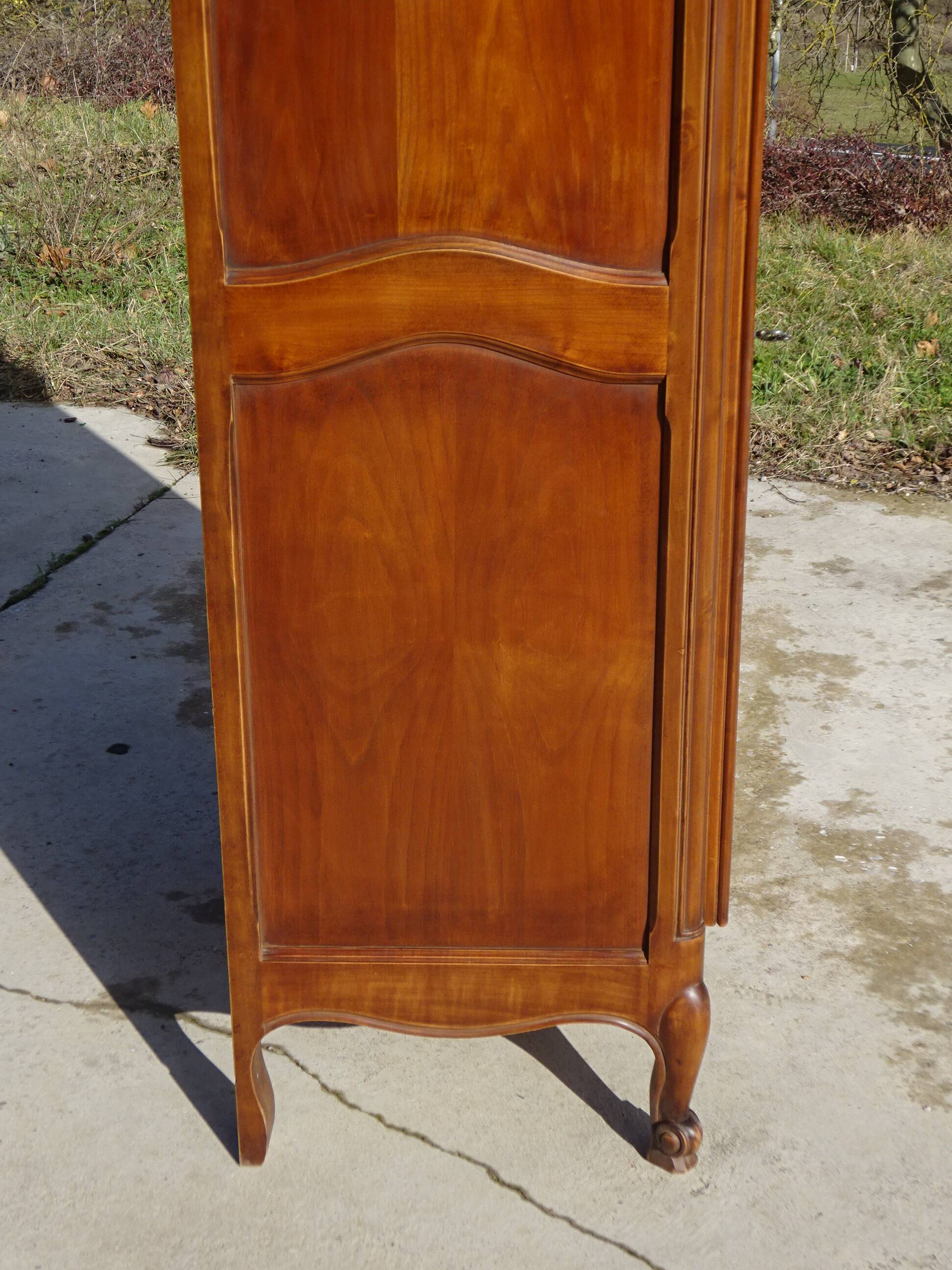 Louis XV style bonnetière in solid cherry wood