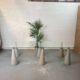 Glass table with cement legs
