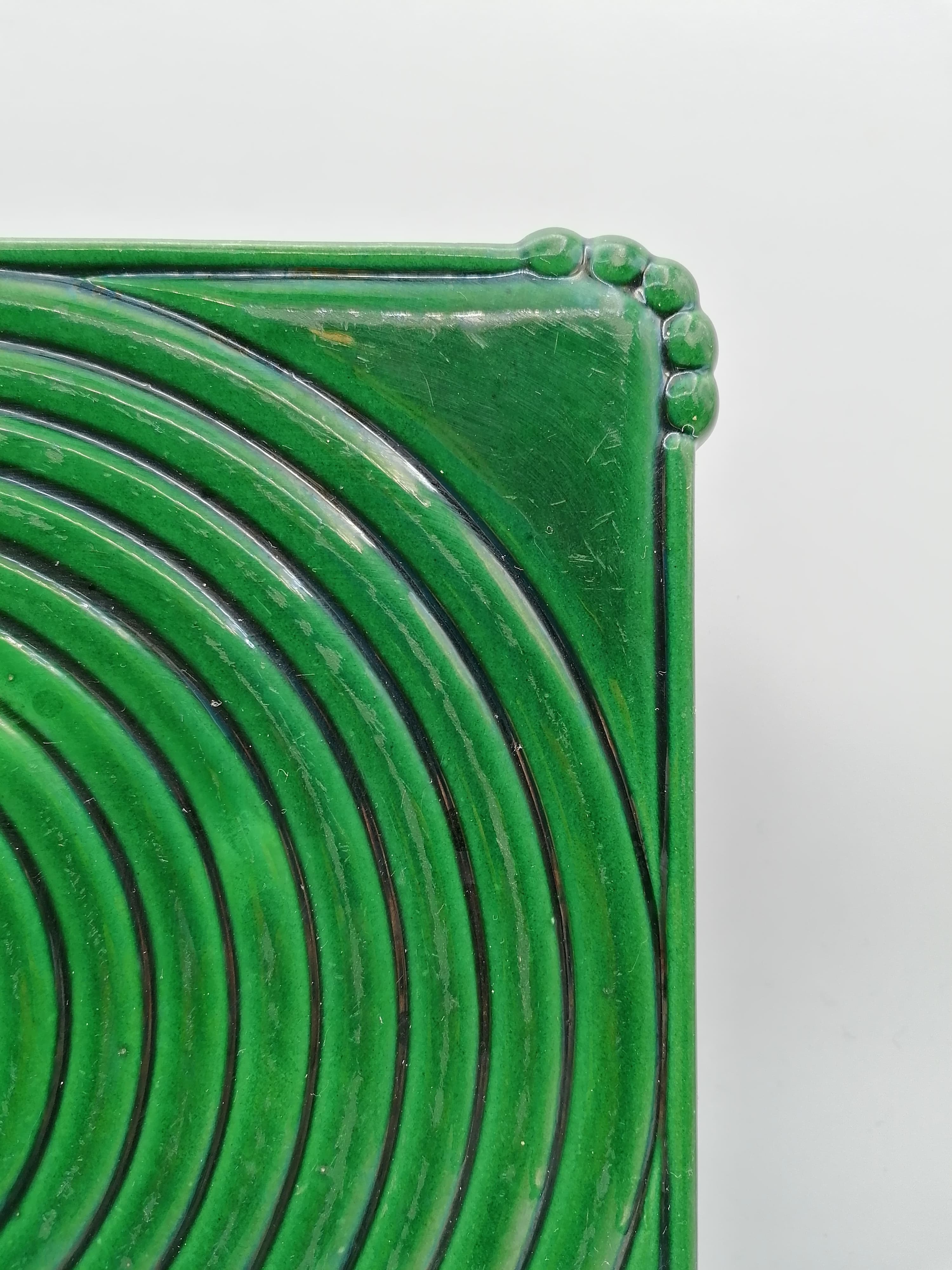 Under the plate and 3 under the bottle