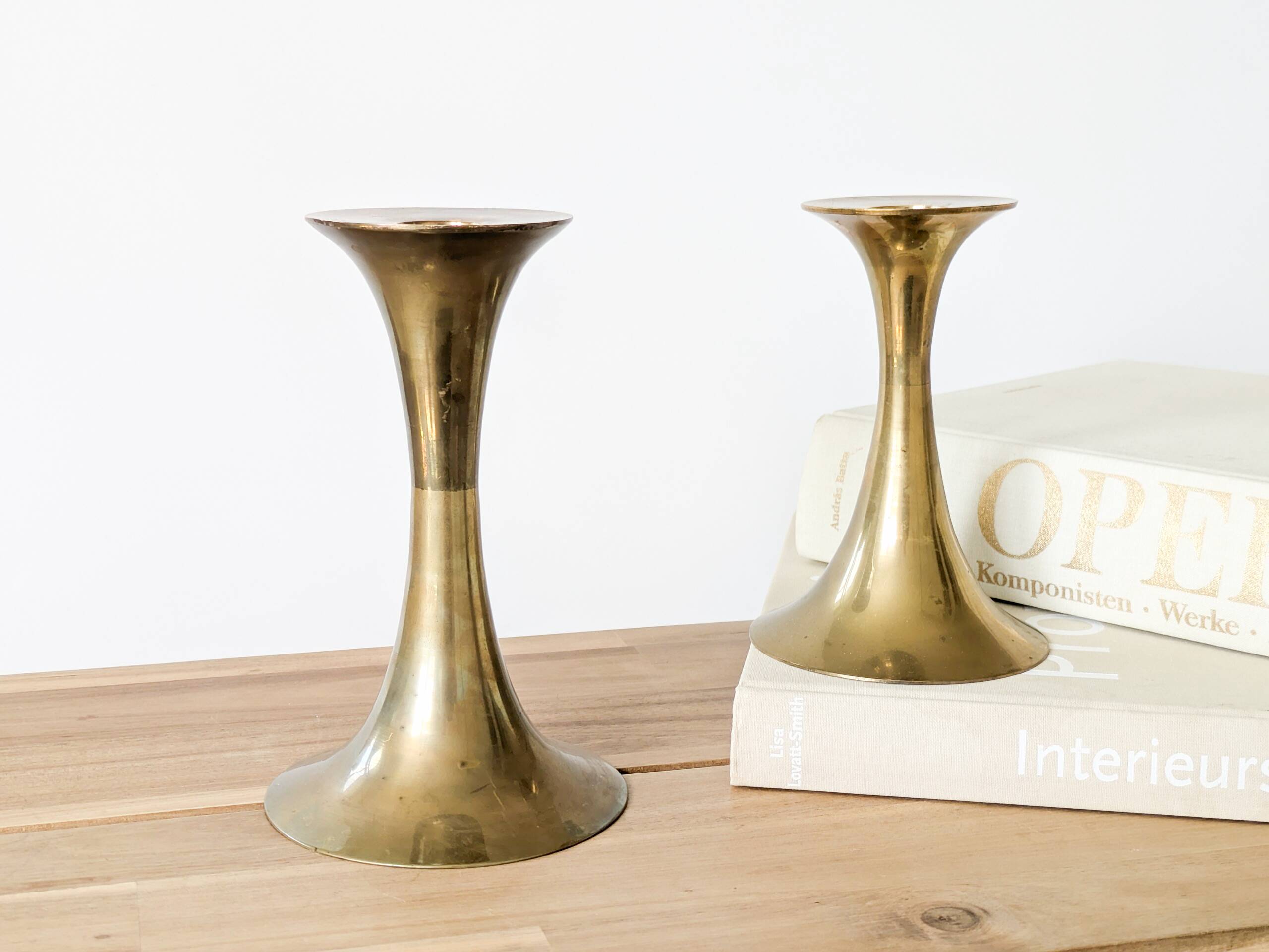 Pair of Midcentury brass candlesticks, flared shape.
