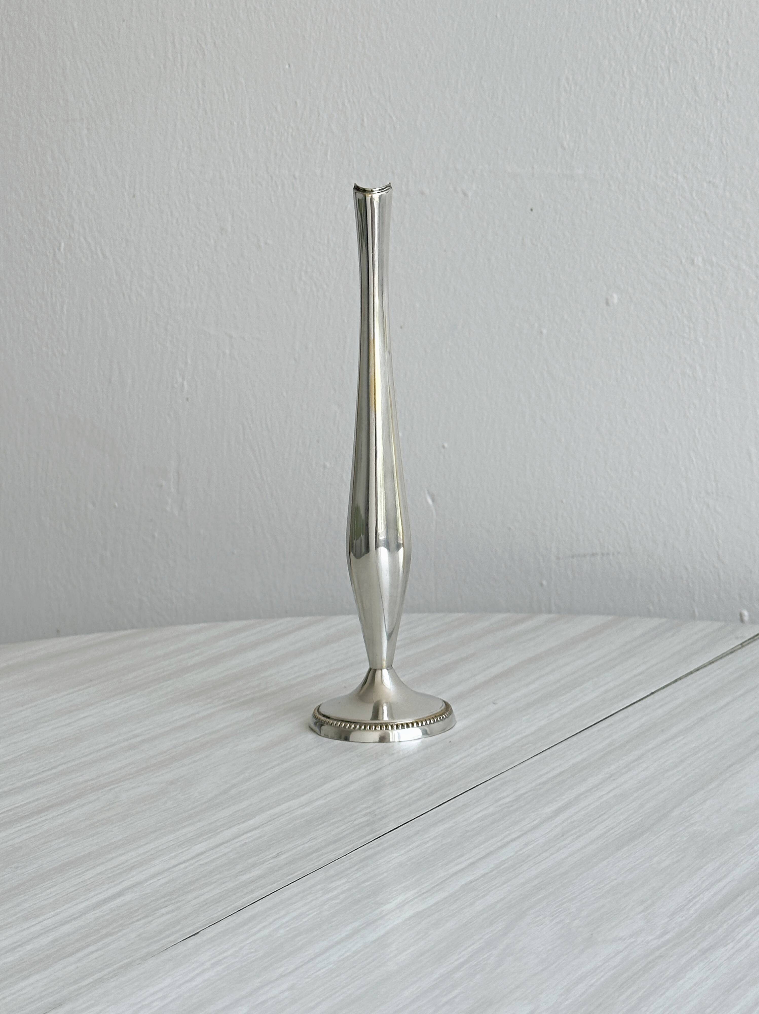 Light metal soliflore