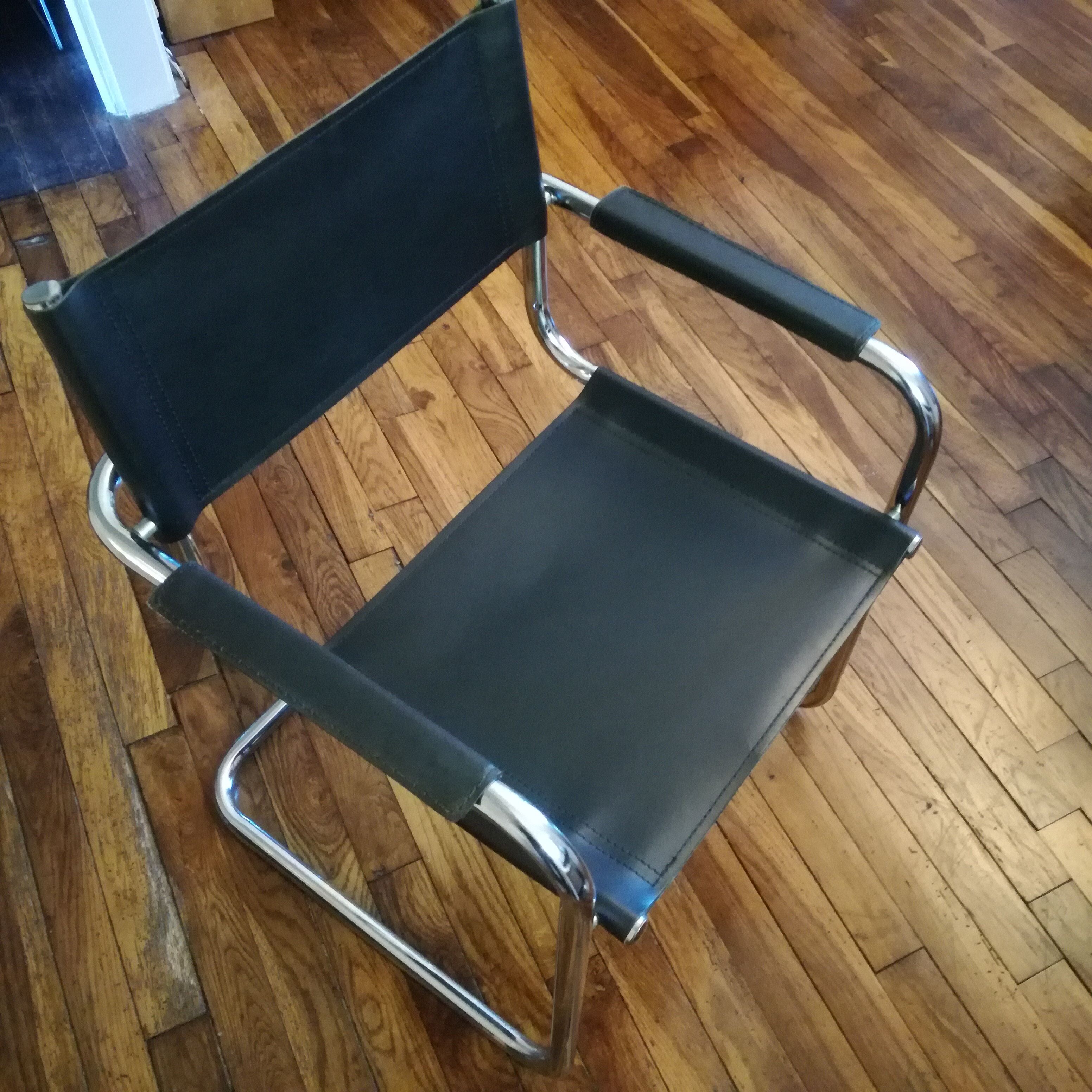Black leather cantilever armchair