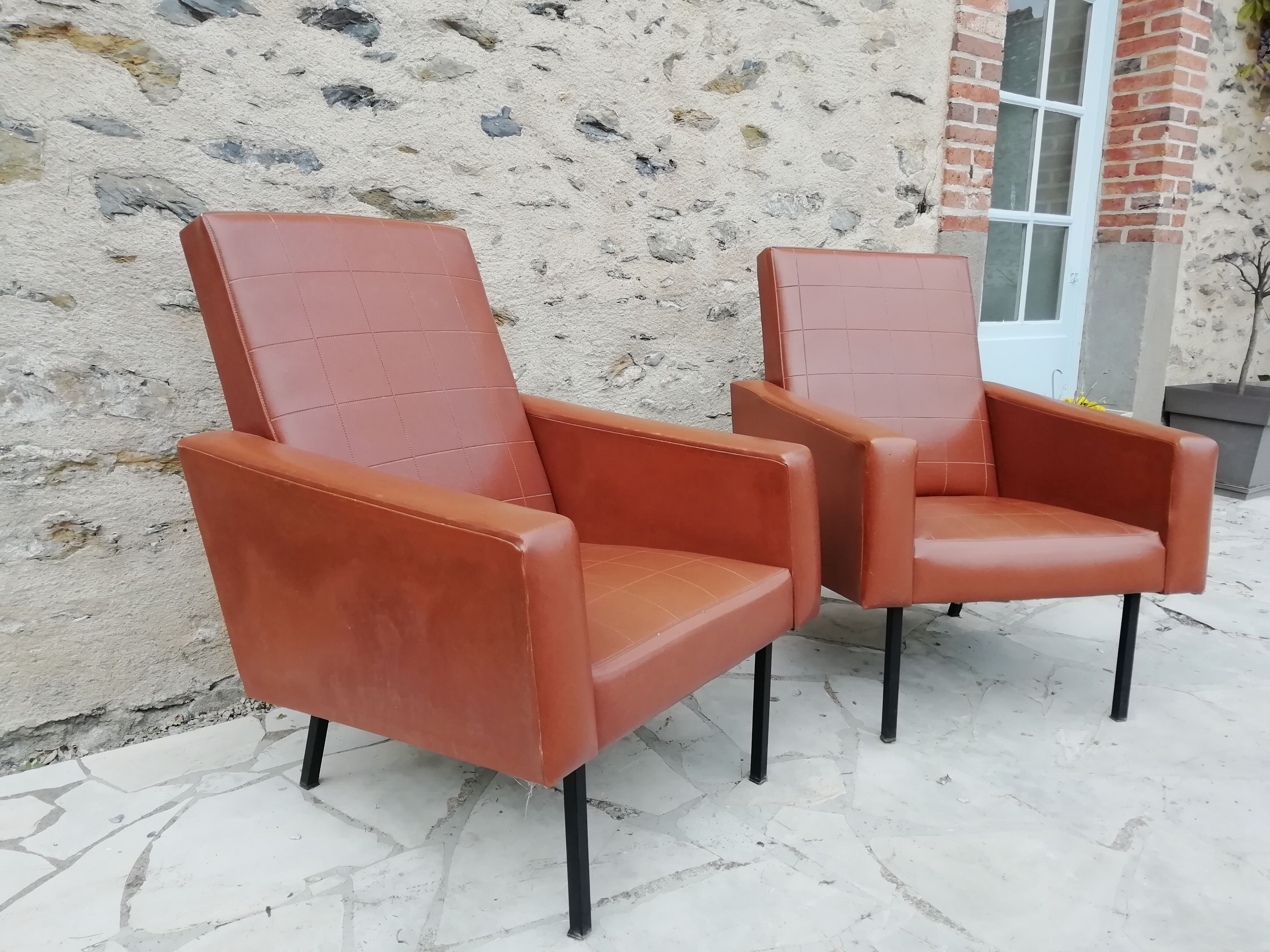 Pair of brown leather faux armchair