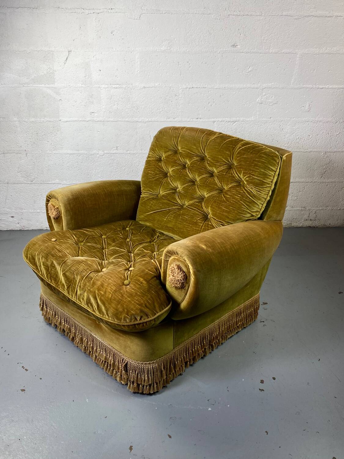 Fauteuil club vintage en tissu vert