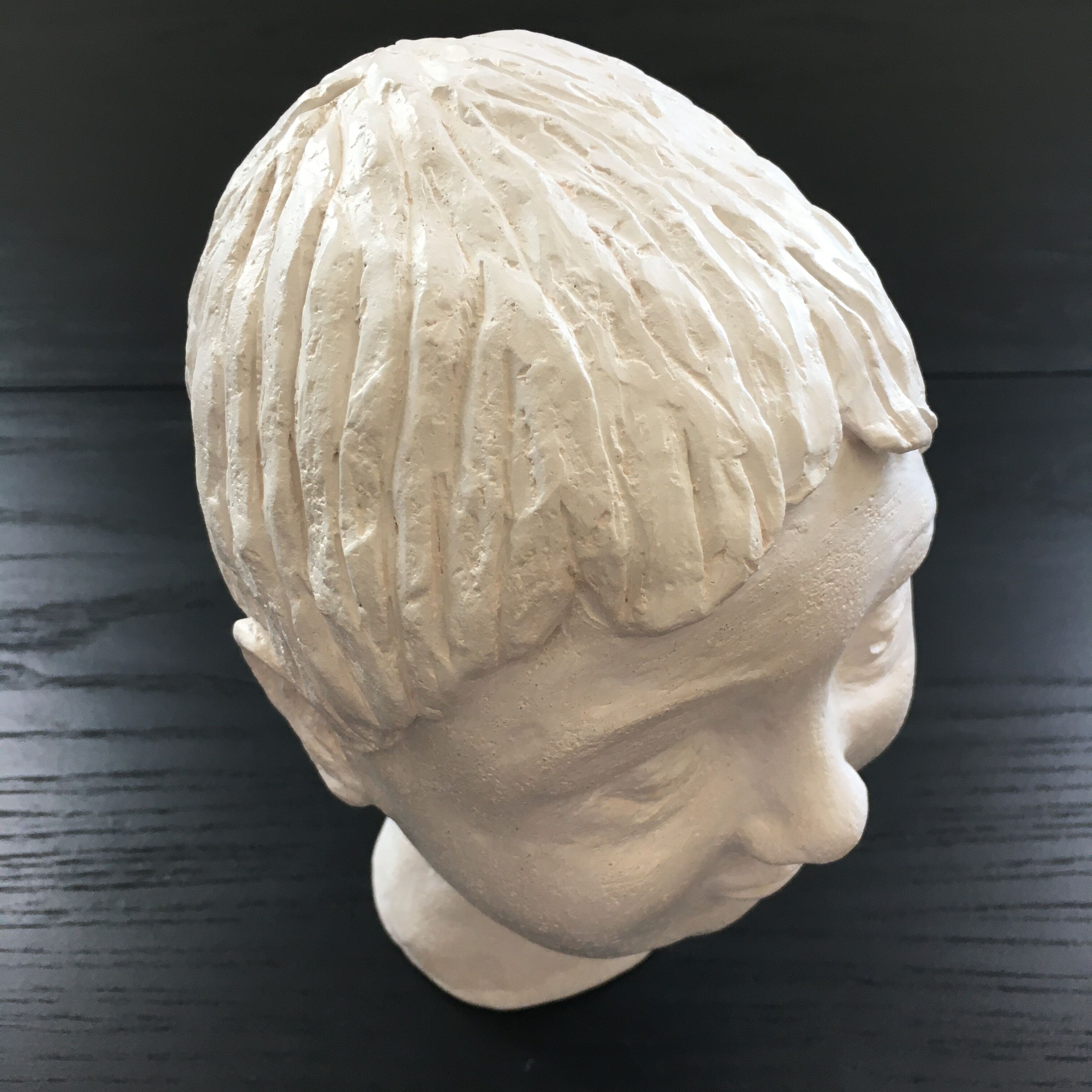 Plaster girl's head