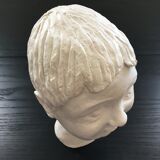 Plaster girl's head