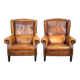 Set of 2 beautiful and correct sheep leather wingback armchairs with fixed seat cushions