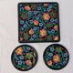 Ensemble émaux de Longwy dessous de plat et de bouteille décor floral