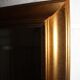 Miroir biseauté 90-58cm en bois doré