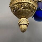 Solid bronze Art Deco style chandelier with iconic handmade lampshades.