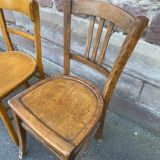 4 mismatched curved wooden bistro chairs