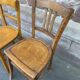4 mismatched curved wooden bistro chairs