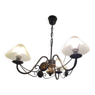 Aged iron and sand glass chandelier with cookies