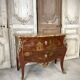 Commode de style Louis XV en laque rouge époque 1900