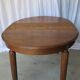 1930s oak dining table, slightly oval.
