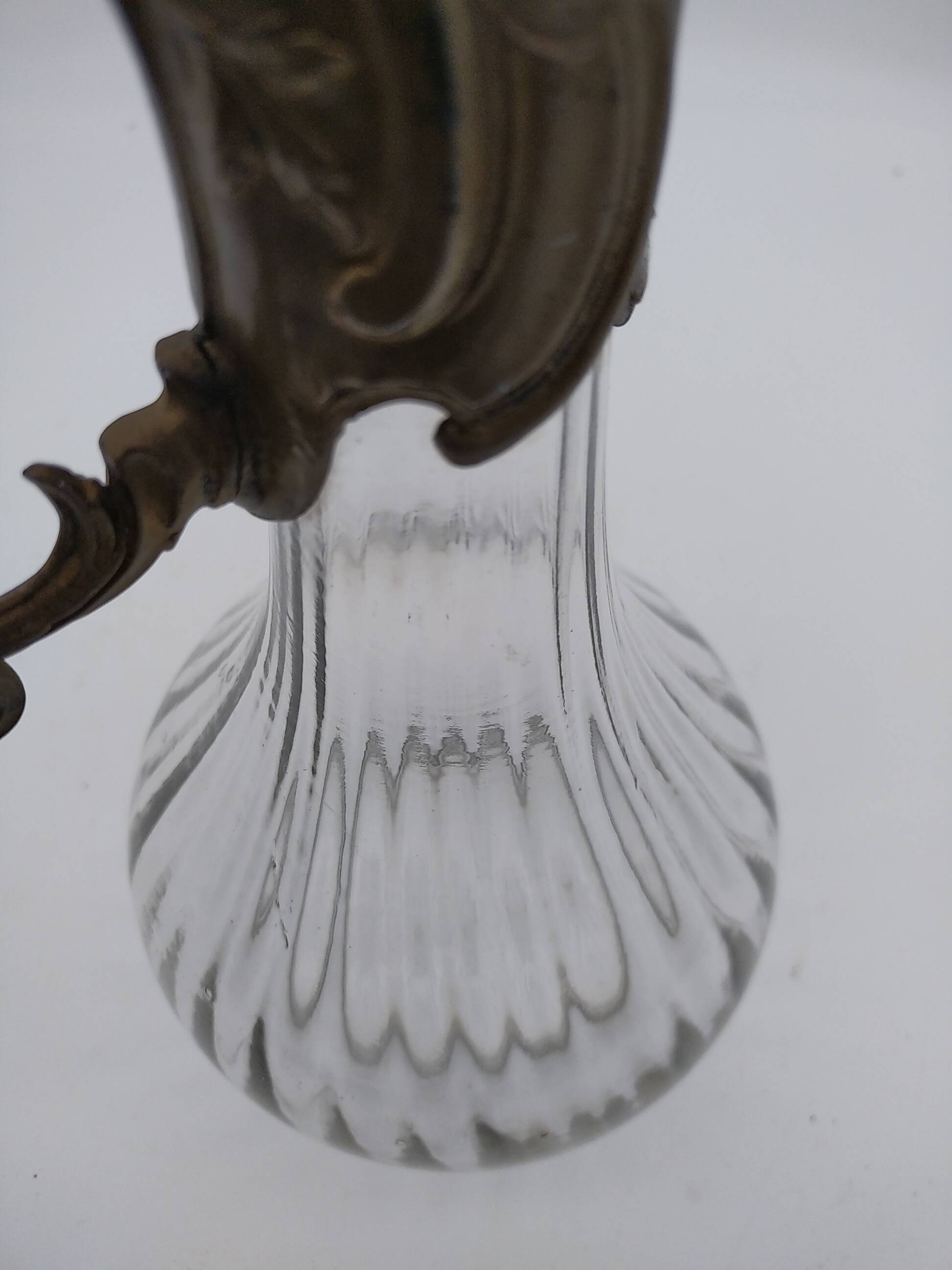 Large balloon glass carafe with pewter frame.