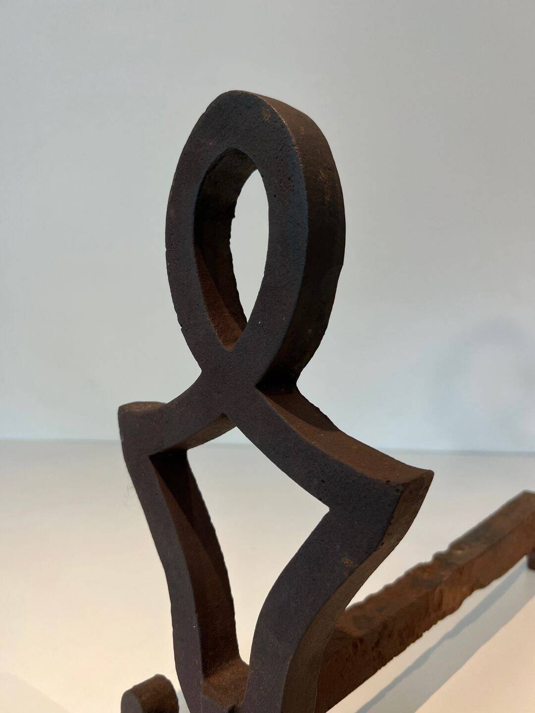 Pair of Modernist Andirons in Cast Iron with Stylised Figure Supports, by Ray